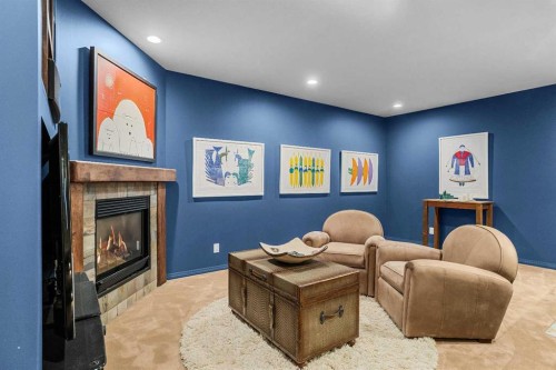 12 Antelope Lane, Banff, AB - Indoor With Fireplace