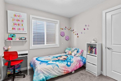 18 Evanscrest Heights Nw, Calgary, AB - Indoor Photo Showing Bedroom