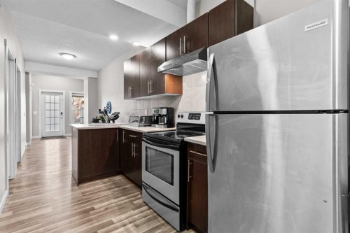 18 Evanscrest Heights Nw, Calgary, AB - Indoor Photo Showing Kitchen With Double Sink