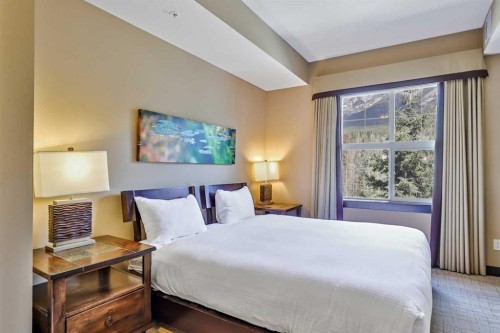 319D-1818 Mountain Avenue, Canmore, AB - Indoor Photo Showing Bedroom