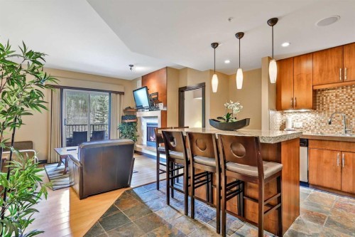 319D-1818 Mountain Avenue, Canmore, AB - Indoor Photo Showing Kitchen With Upgraded Kitchen