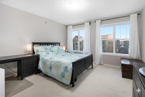 802 Walden Drive Se, Calgary, AB - Indoor Photo Showing Bedroom