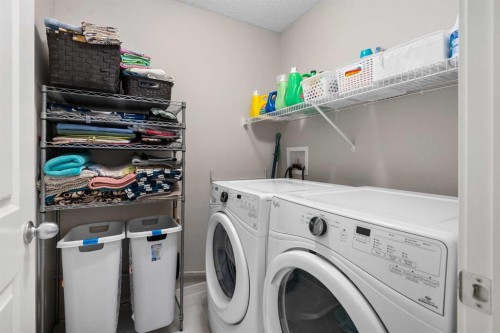 802 Walden Drive Se, Calgary, AB - Indoor Photo Showing Laundry Room