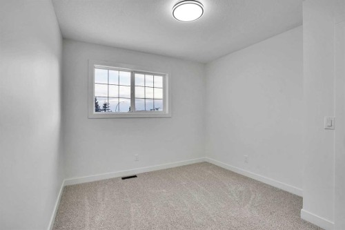 55 Coral Springs Close Ne, Calgary, AB - Indoor Photo Showing Other Room