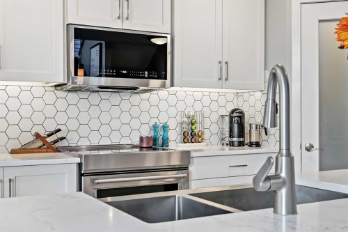 92 Cranwell Green Se, Calgary, AB - Indoor Photo Showing Kitchen With Stainless Steel Kitchen With Double Sink