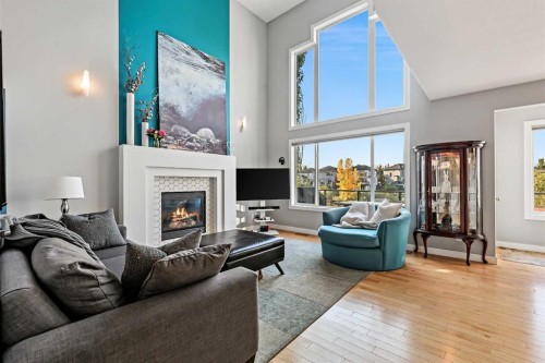 92 Cranwell Green Se, Calgary, AB - Indoor Photo Showing Living Room With Fireplace