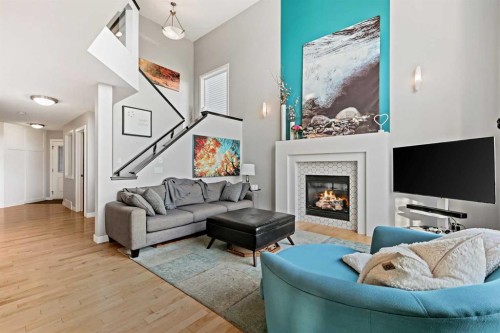 92 Cranwell Green Se, Calgary, AB - Indoor Photo Showing Living Room With Fireplace