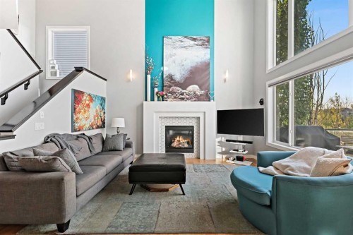 92 Cranwell Green Se, Calgary, AB - Indoor Photo Showing Living Room With Fireplace