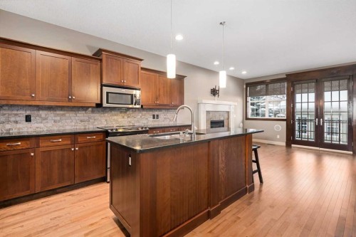 5628 Henwood Street Sw, Calgary, AB - Indoor Photo Showing Kitchen With Double Sink