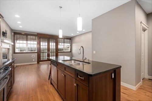 5628 Henwood Street Sw, Calgary, AB - Indoor Photo Showing Kitchen With Double Sink