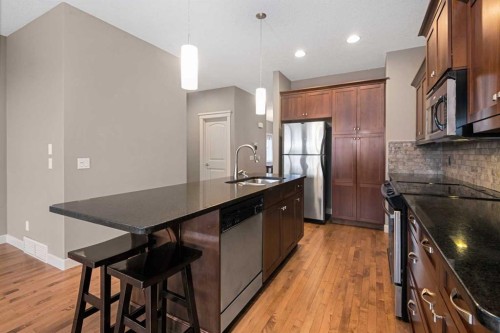 5628 Henwood Street Sw, Calgary, AB - Indoor Photo Showing Kitchen With Stainless Steel Kitchen With Upgraded Kitchen