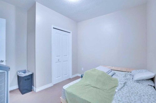 21 Saddlelake Gardens Ne, Calgary, AB - Indoor Photo Showing Bedroom