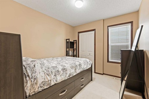 1976 New Brighton Drive Se, Calgary, AB - Indoor Photo Showing Bedroom