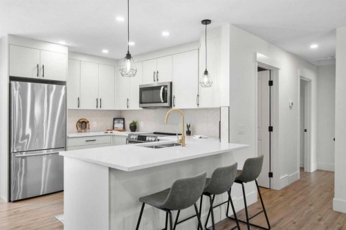 144 Deer Ridge Way Se, Calgary, AB - Indoor Photo Showing Kitchen With Stainless Steel Kitchen With Upgraded Kitchen