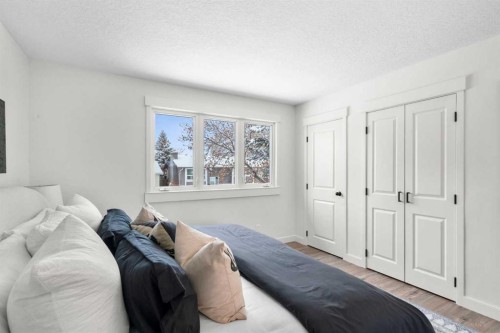 144 Deer Ridge Way Se, Calgary, AB - Indoor Photo Showing Bedroom