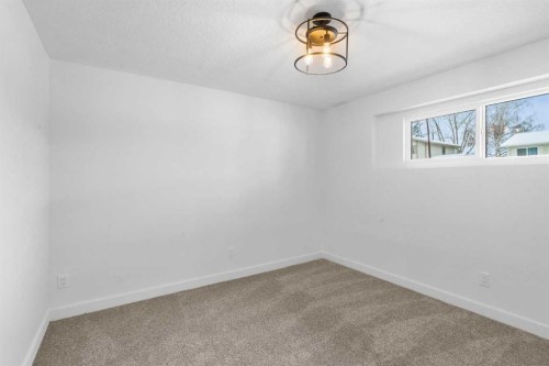144 Deer Ridge Way Se, Calgary, AB - Indoor Photo Showing Other Room