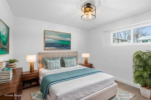144 Deer Ridge Way Se, Calgary, AB - Indoor Photo Showing Bedroom