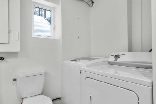 144 Deer Ridge Way Se, Calgary, AB - Indoor Photo Showing Laundry Room
