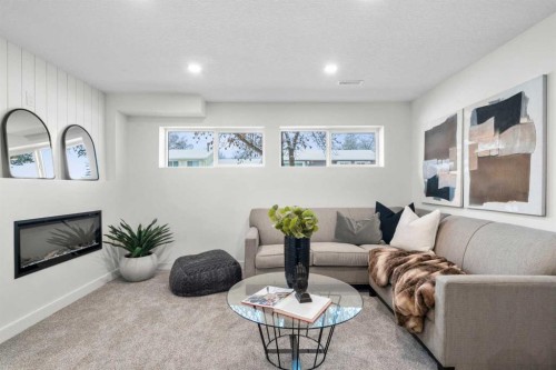 144 Deer Ridge Way Se, Calgary, AB - Indoor Photo Showing Living Room