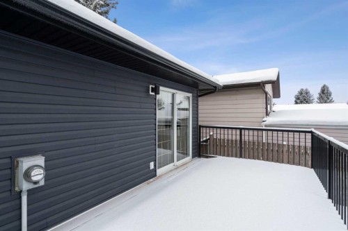 144 Deer Ridge Way Se, Calgary, AB - Outdoor With Deck Patio Veranda With Exterior