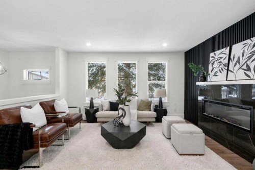 144 Deer Ridge Way Se, Calgary, AB - Indoor Photo Showing Living Room