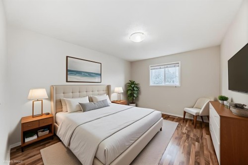 576 Stonegate Way Nw, Airdrie, AB - Indoor Photo Showing Bedroom