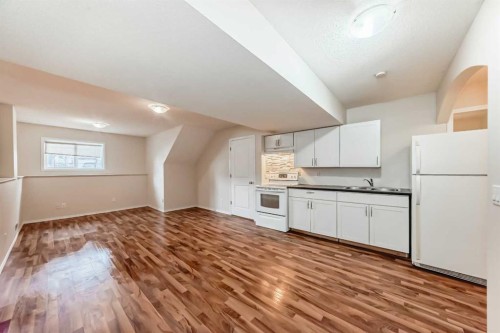 576 Stonegate Way Nw, Airdrie, AB - Indoor Photo Showing Kitchen With Double Sink