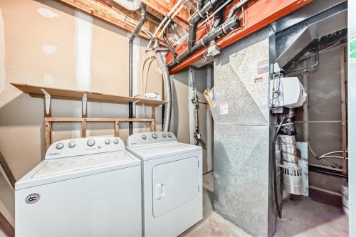 576 Stonegate Way Nw, Airdrie, AB - Indoor Photo Showing Laundry Room