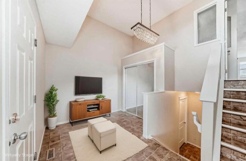 576 Stonegate Way Nw, Airdrie, AB - Indoor Photo Showing Other Room