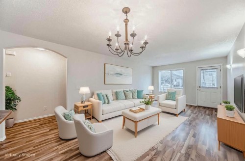 576 Stonegate Way Nw, Airdrie, AB - Indoor Photo Showing Living Room