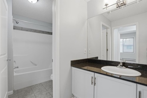 210-8 Prestwick Pond Terrace Se, Calgary, AB - Indoor Photo Showing Bathroom