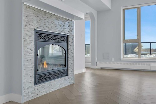 305-35 Inglewood Park Se, Calgary, AB - Indoor Photo Showing Other Room With Fireplace