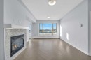 305-35 Inglewood Park Se, Calgary, AB  - Indoor Photo Showing Living Room With Fireplace 