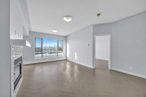 305-35 Inglewood Park Se, Calgary, AB - Indoor Photo Showing Other Room With Fireplace