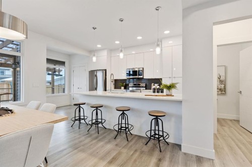 584 River Avenue, Cochrane, AB - Indoor Photo Showing Kitchen With Upgraded Kitchen