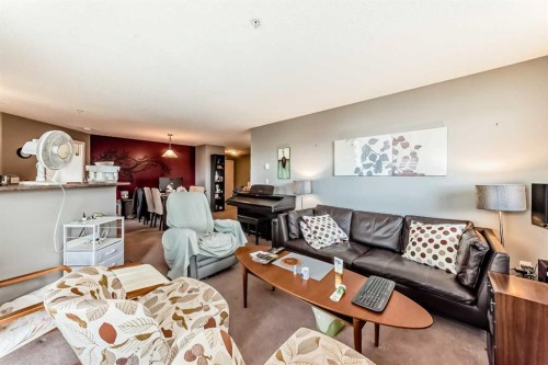 3211-4975 130 Avenue Se, Calgary, AB - Indoor Photo Showing Living Room