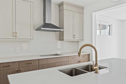 438 Lucas Way Nw, Calgary, AB - Indoor Photo Showing Kitchen With Double Sink