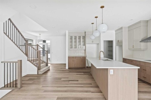 438 Lucas Way Nw, Calgary, AB - Indoor Photo Showing Kitchen With Upgraded Kitchen