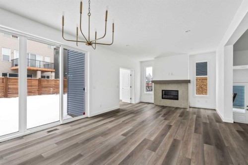 438 Lucas Way Nw, Calgary, AB - Indoor With Fireplace