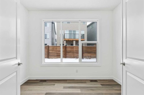 438 Lucas Way Nw, Calgary, AB - Indoor Photo Showing Other Room