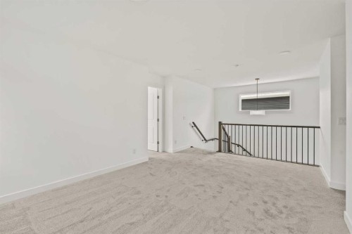 438 Lucas Way Nw, Calgary, AB - Indoor Photo Showing Other Room