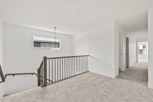 438 Lucas Way Nw, Calgary, AB - Indoor Photo Showing Other Room