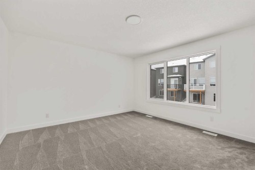 438 Lucas Way Nw, Calgary, AB - Indoor Photo Showing Other Room