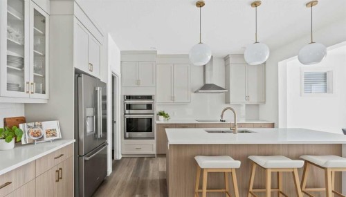438 Lucas Way Nw, Calgary, AB - Indoor Photo Showing Kitchen With Upgraded Kitchen