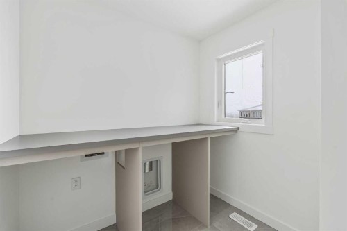 438 Lucas Way Nw, Calgary, AB - Indoor Photo Showing Other Room
