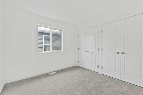 438 Lucas Way Nw, Calgary, AB - Indoor Photo Showing Other Room