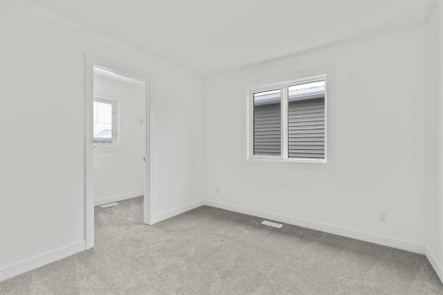 438 Lucas Way Nw, Calgary, AB - Indoor Photo Showing Other Room