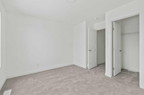 438 Lucas Way Nw, Calgary, AB - Indoor Photo Showing Other Room