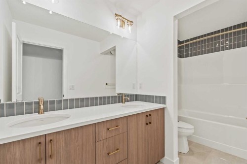 438 Lucas Way Nw, Calgary, AB - Indoor Photo Showing Bathroom