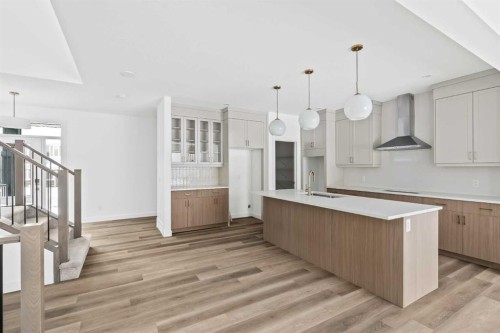 438 Lucas Way Nw, Calgary, AB - Indoor Photo Showing Kitchen With Upgraded Kitchen